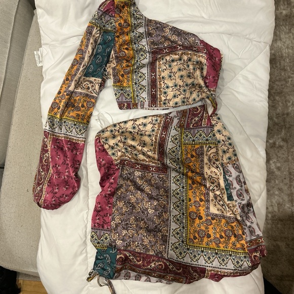 Sky to the moon asymmetrical dress
Wore once - Picture 3 of 4